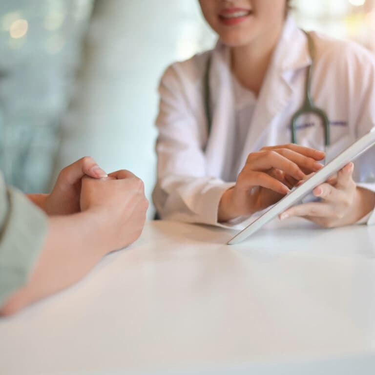 Doctor interacting with patient